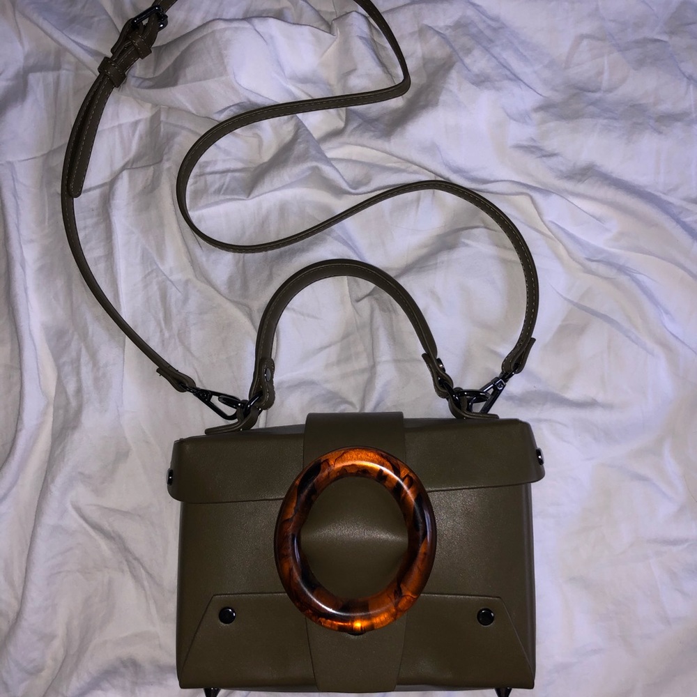 Green crossbody with tortoise shell detail